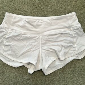 White Lulu lemon low rise speed up shorts